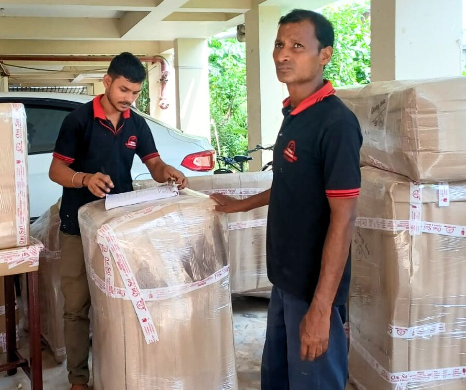 Packers and Movers in Dehradun packing household goods safely – Om Sai Packers and Movers team at work